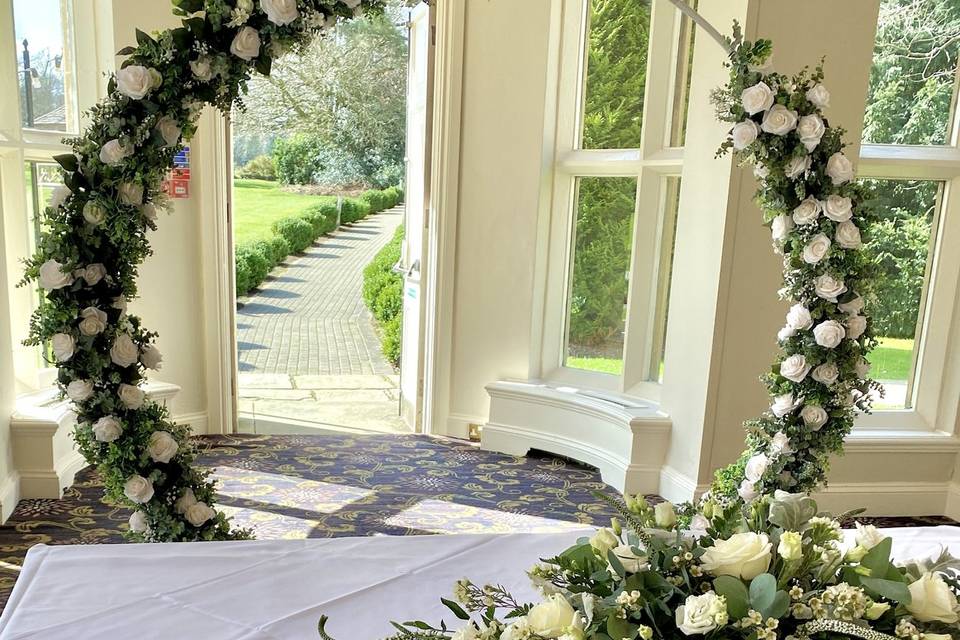 Round floral ceremony arch