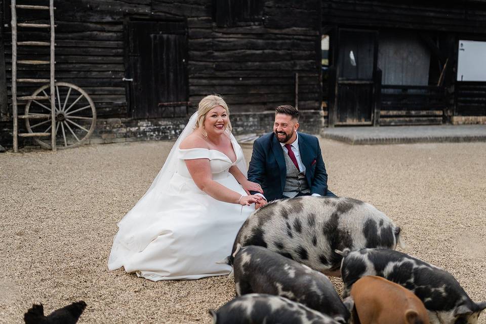 Bride and Groom with piglet