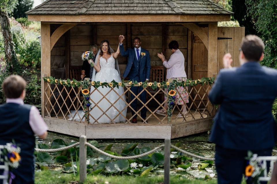 Bride and Groom in Summerhouse