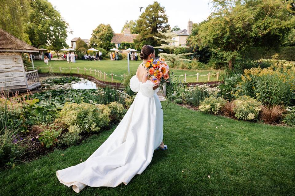 Bride in formal gardens