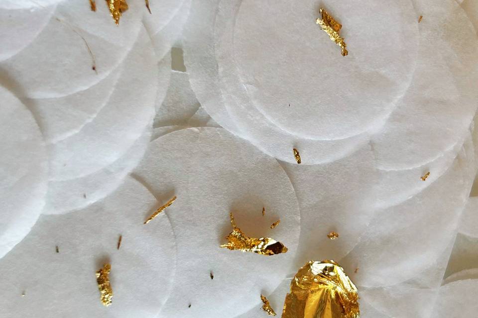Paper and gold confetti