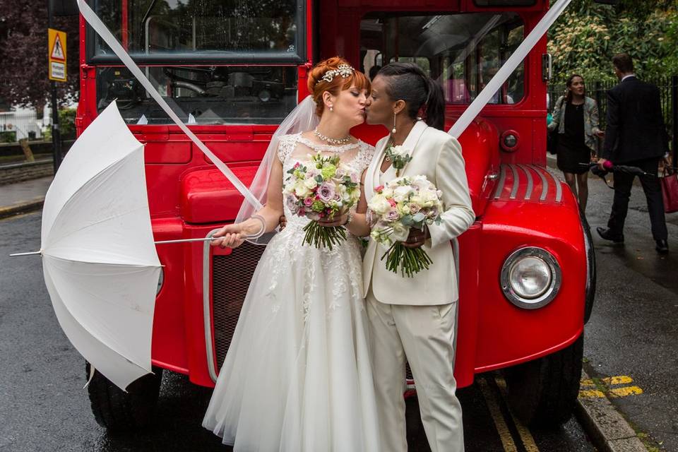 Two bride wedding on the bus