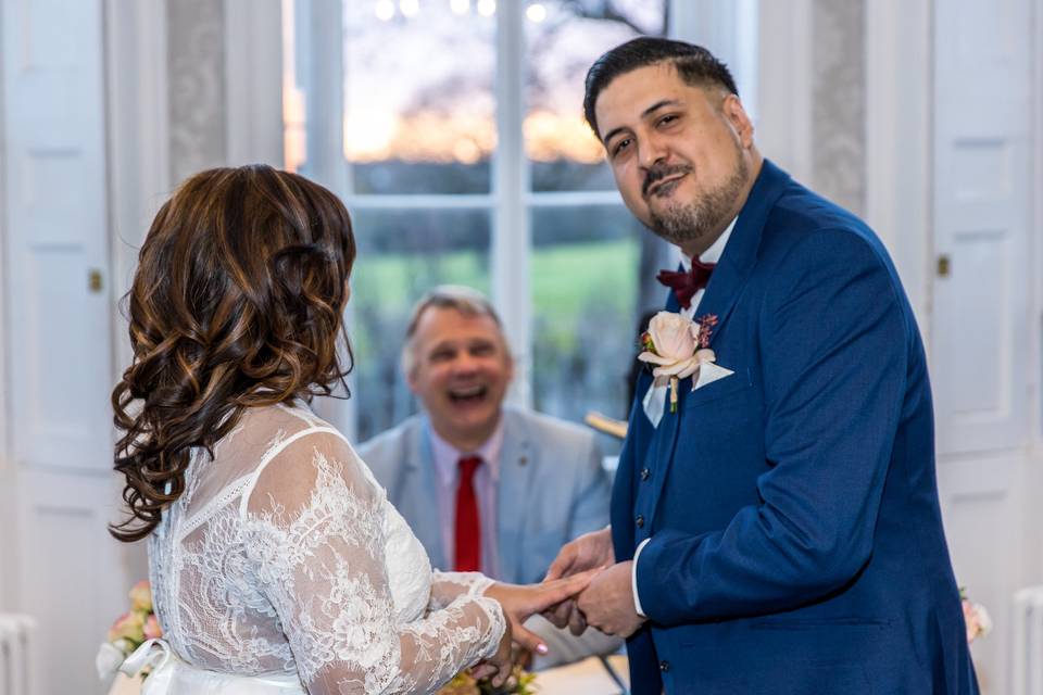 The bride's dress hangs neatly