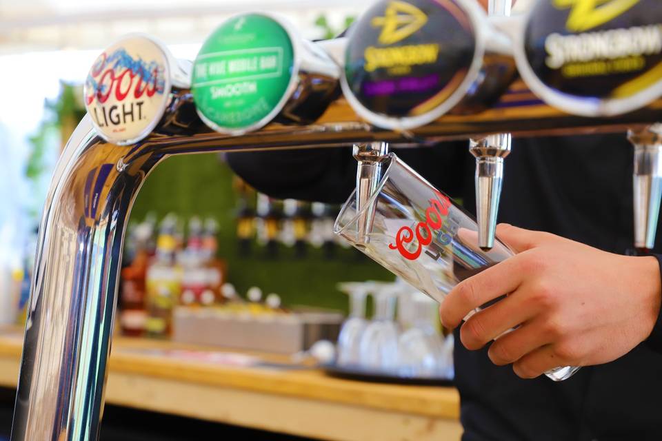 Pouring drinks at the bar