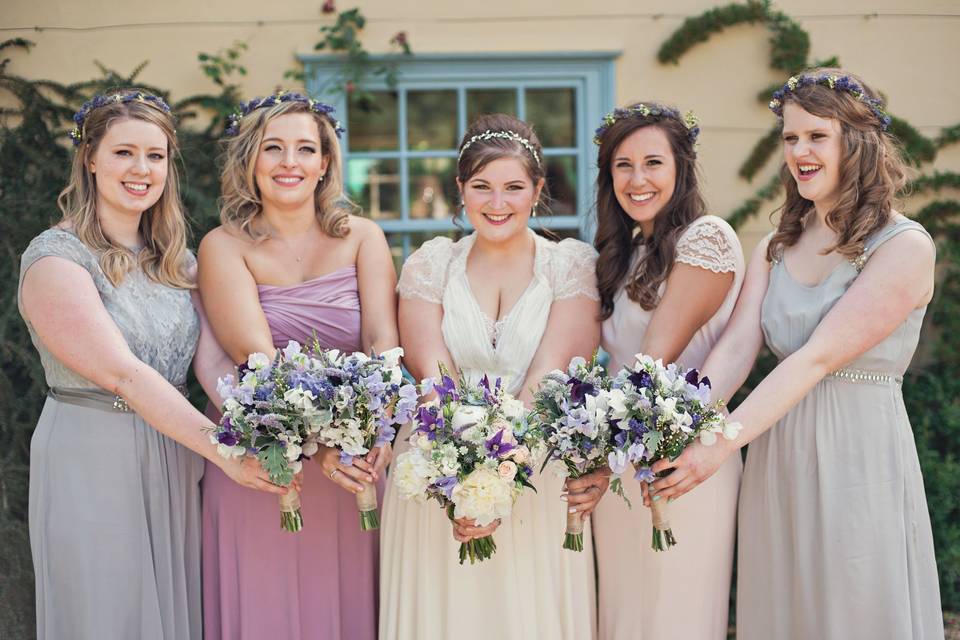 Posing with their bouquets