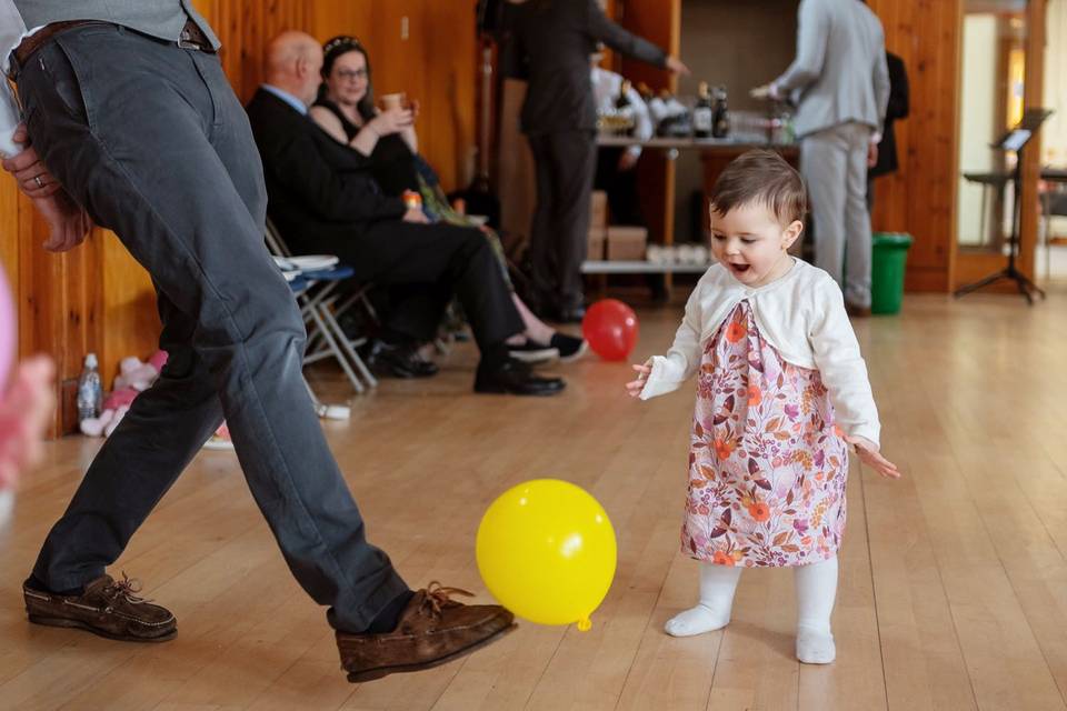 Baby enjoying a balloon