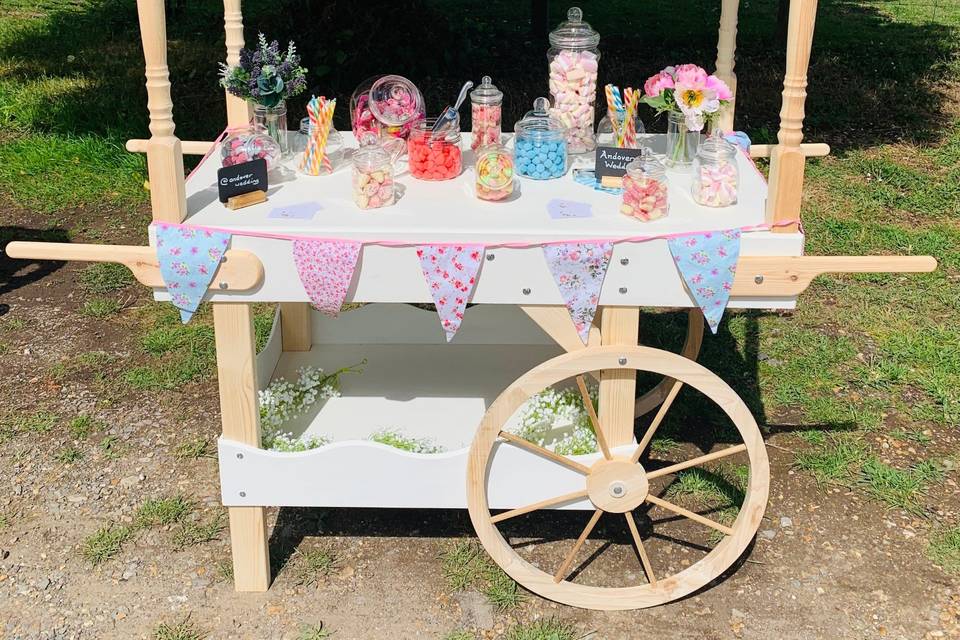 Vintage candy cart with colourful bunting