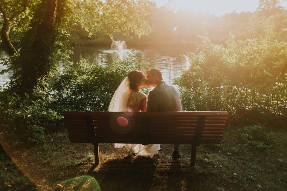 Couple seated on a bench - 21 Degrees Wedding Videography