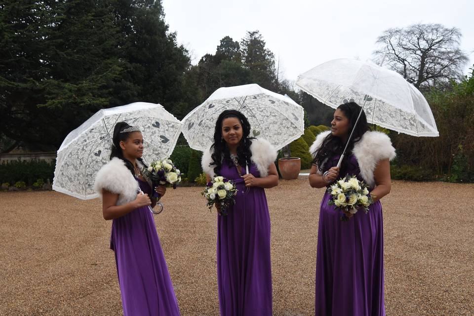 The bridesmaids pose for shots