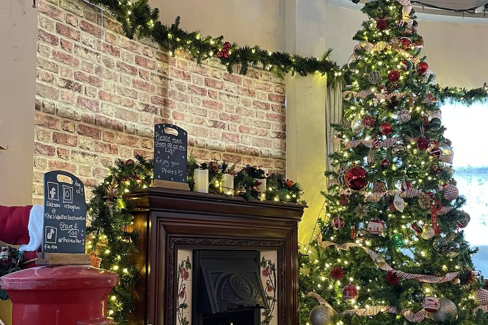 Christmas decor and fireplace