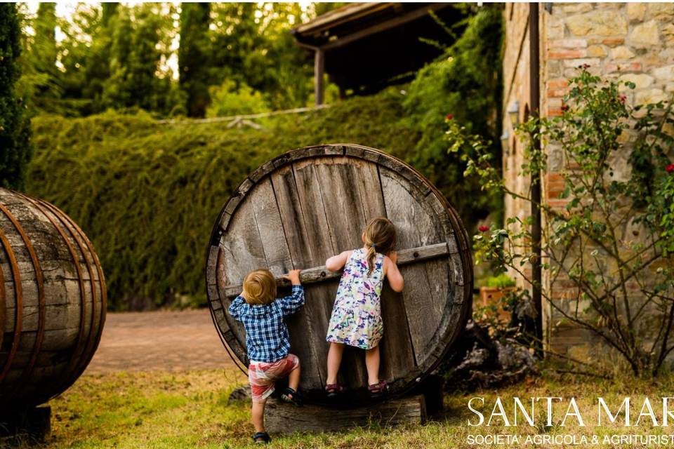 Kids on barrels