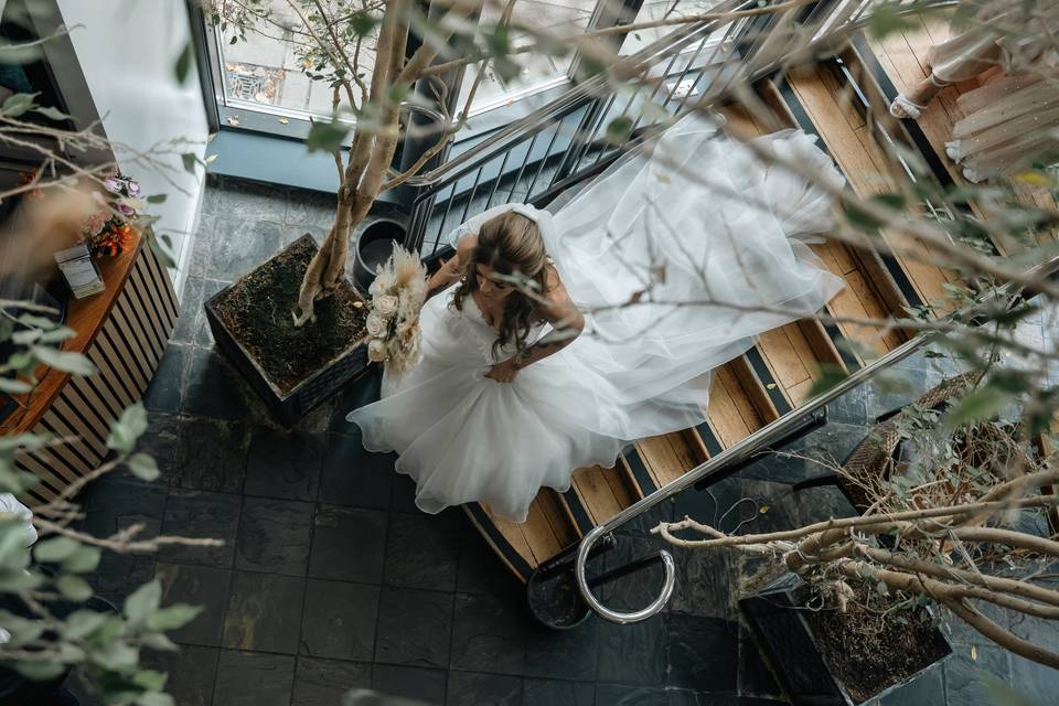 Bride walking down the stairs