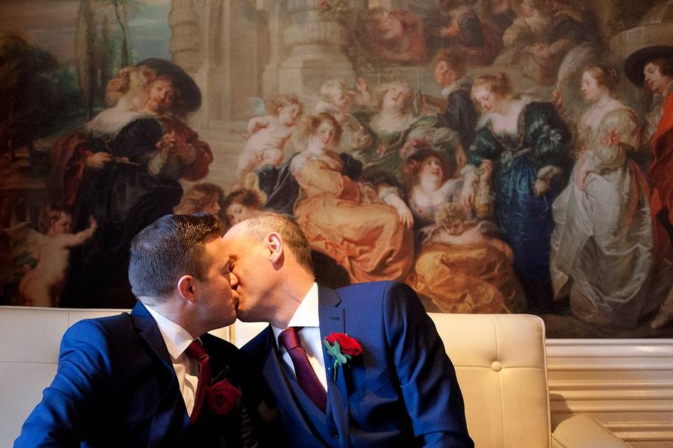 Two Grooms kissing