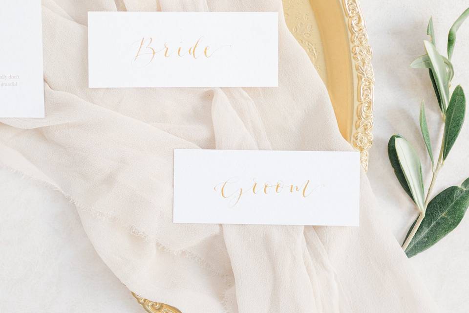 Gold calligraphy place cards