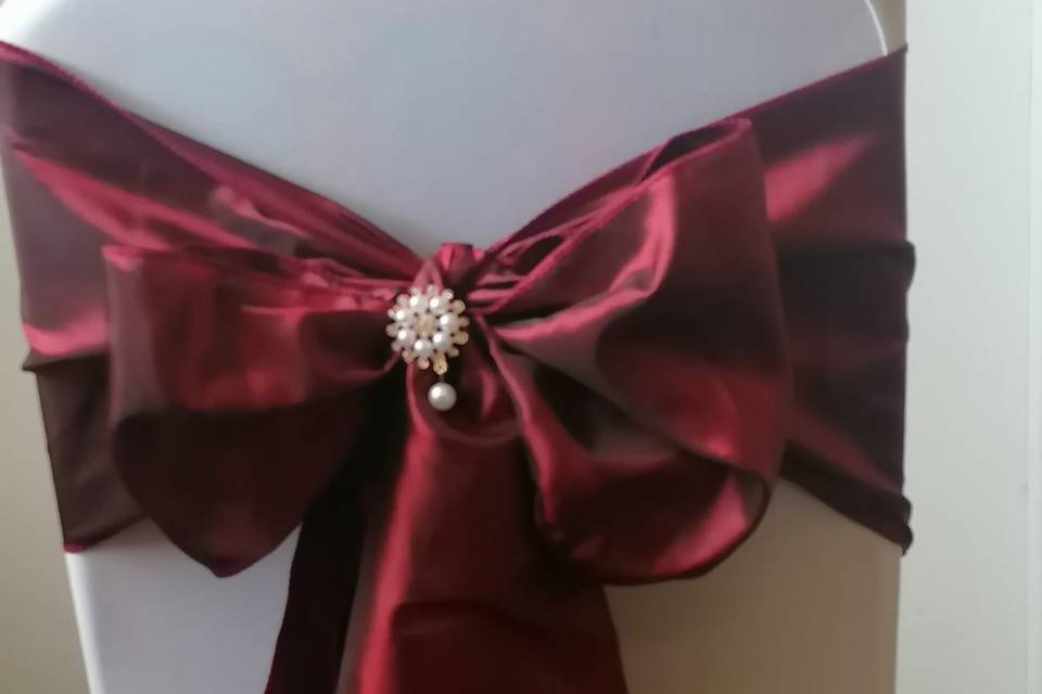 Taffeta sash & brooch