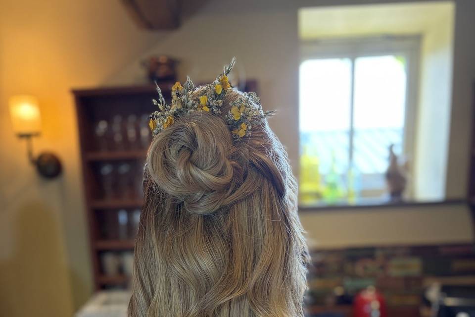 Messy bun with loose waves