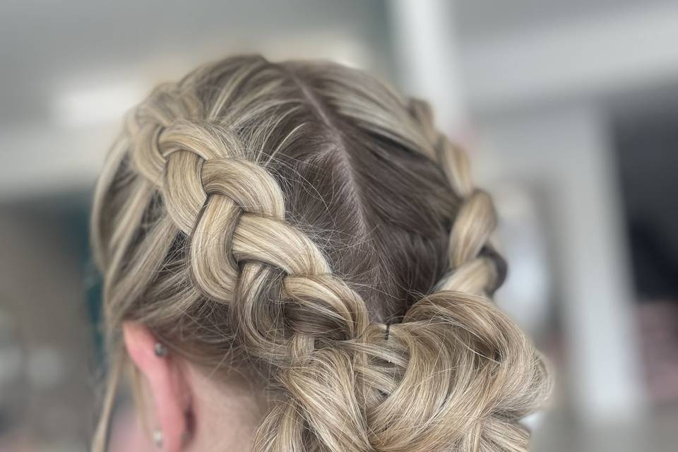 Two braids into messy bun