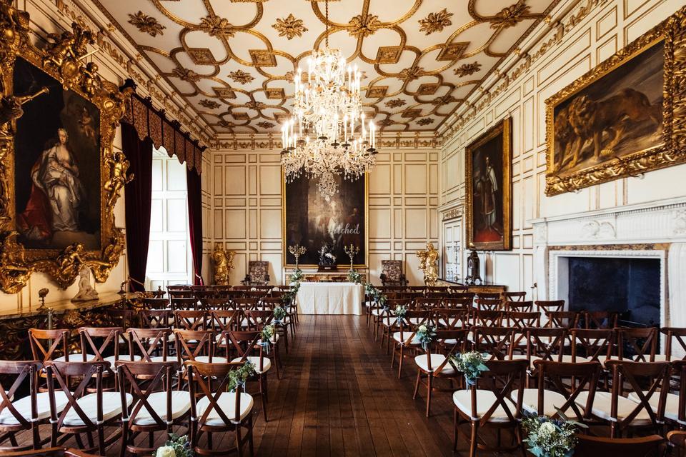 The inside of one of Warwick Castle's regal ceremony rooms set up for an elegant wedding