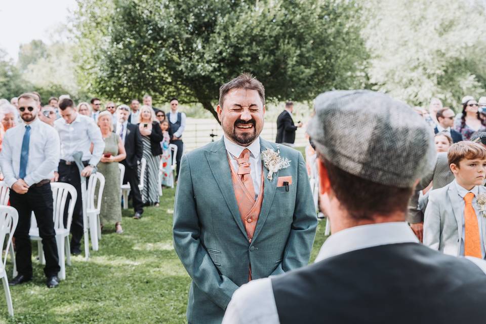 Groom Laughing