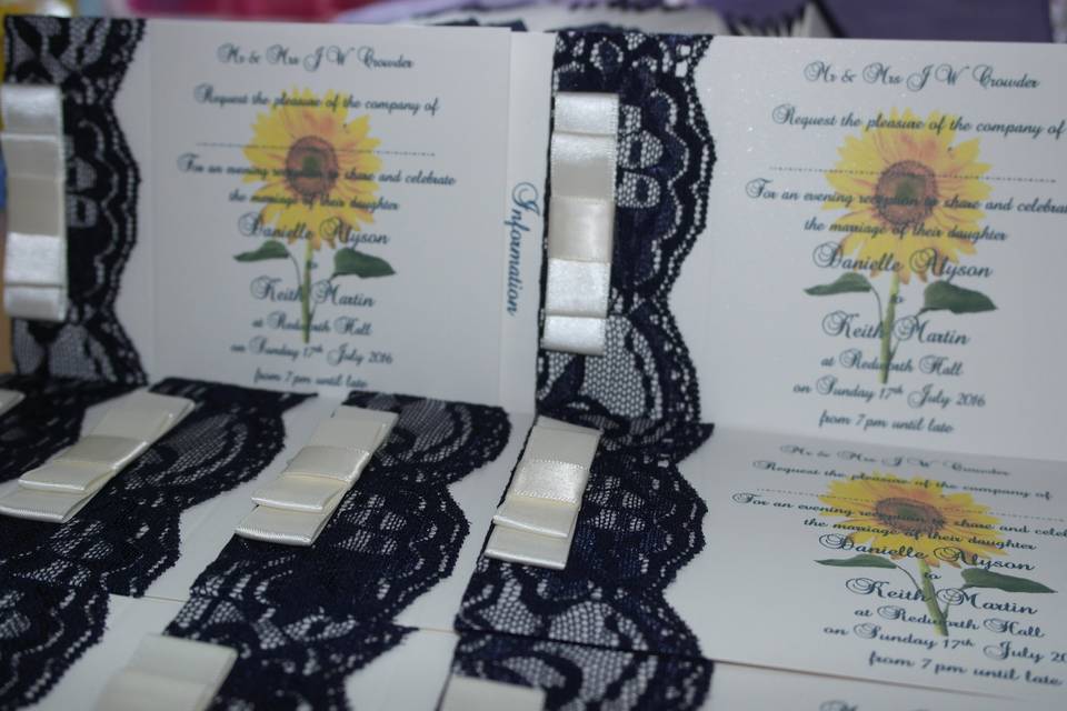 Navy lace and sunflower invite