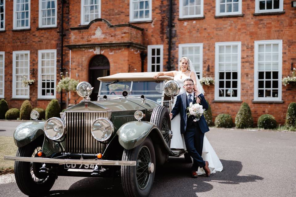 Couple with rolls royce
