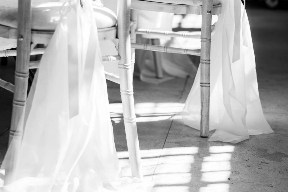 Chairs, drapes and posies