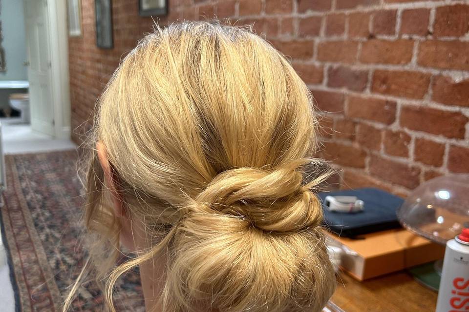 Messy low updo