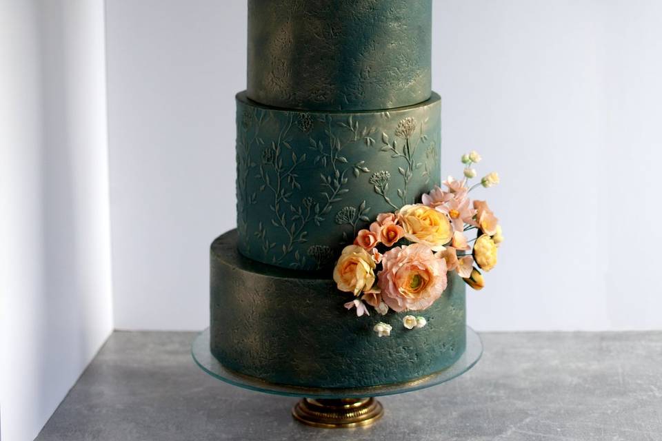 Turquoise and gold cake