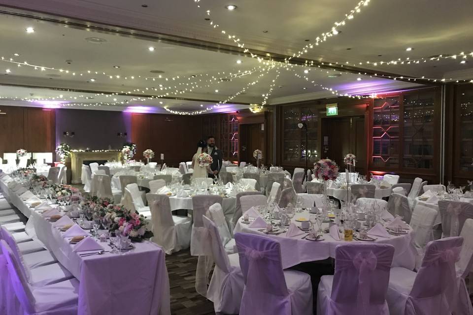 Purple and white reception decor