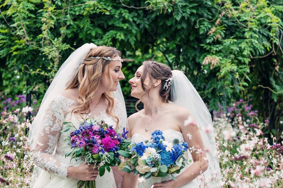 Holding bouquets at Gaynes Park