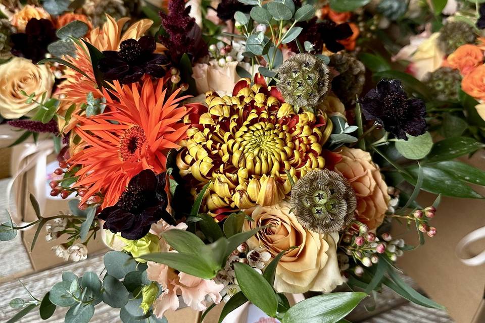 Autumnal bridesmaids flowers