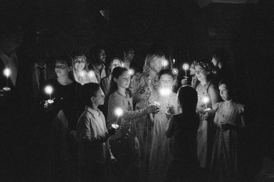 Children in candlelight