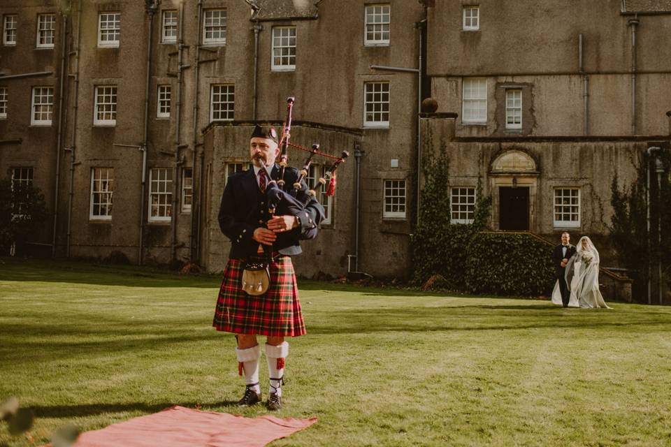 Piper for a true Scottish feel