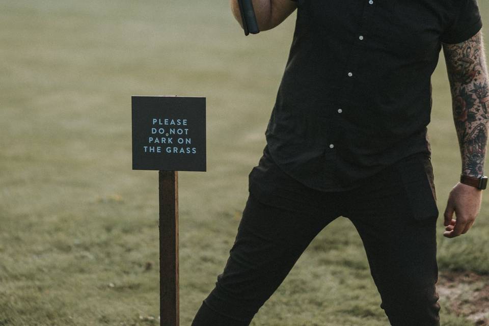 Tom falling over a sign