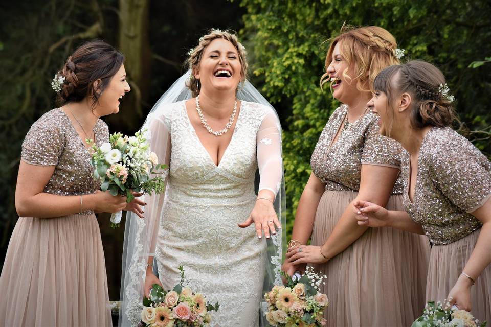 Laughing with bridesmaids