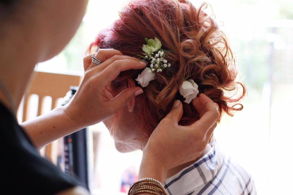 High bun with curls and floral