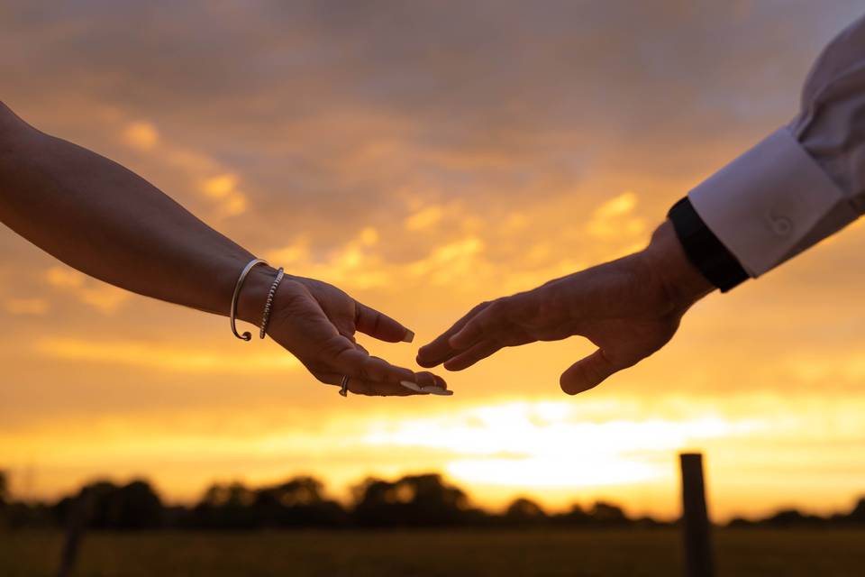 Hands and sunset