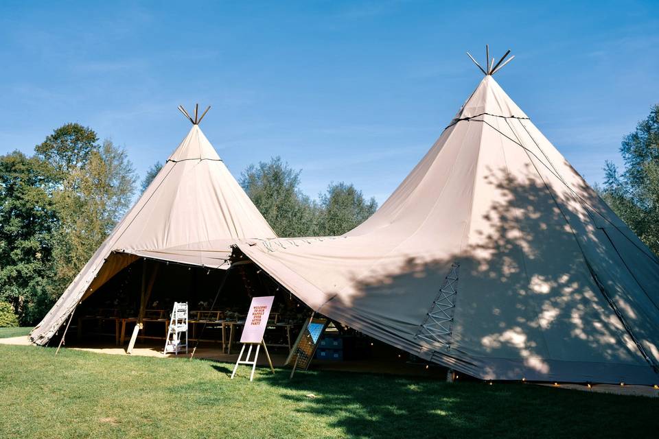 Tipis beside the lake