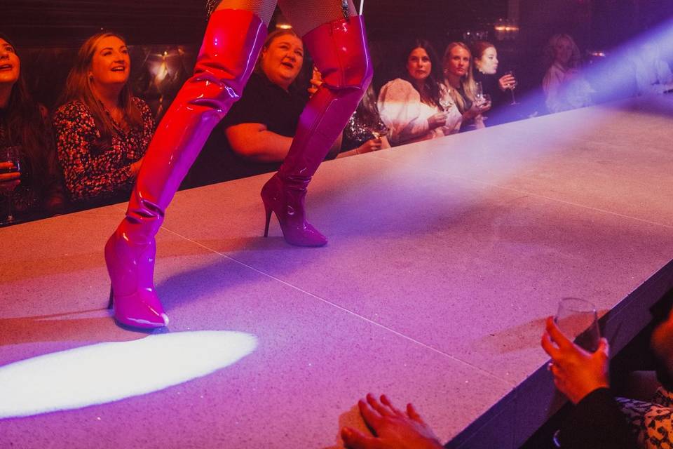 Fire eater on the stage table