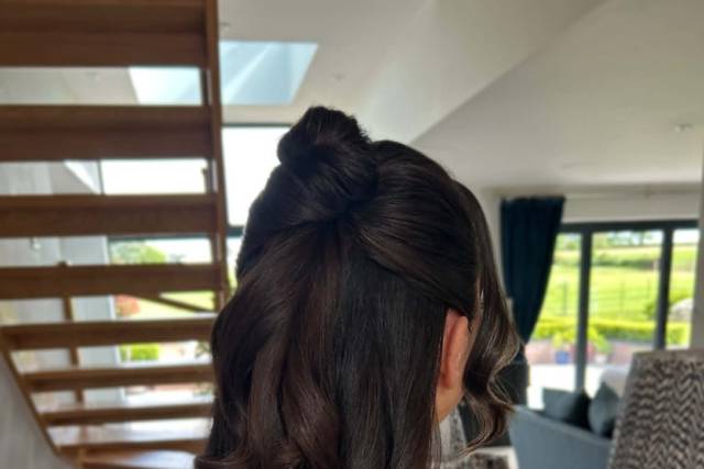 Half--up style with soft curls