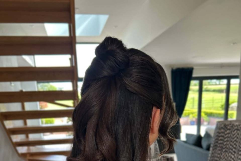 Half--up style with soft curls