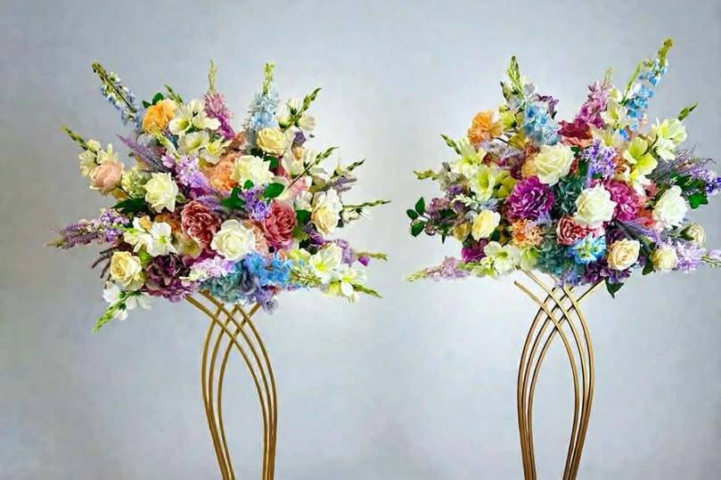 Pastel faux flowers on stands