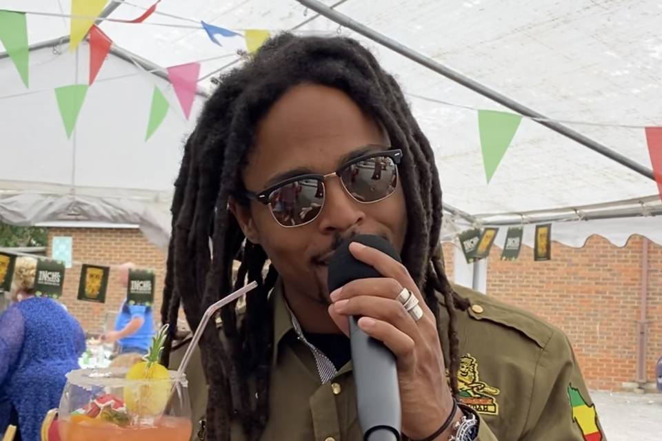 Performing as Bob Marley