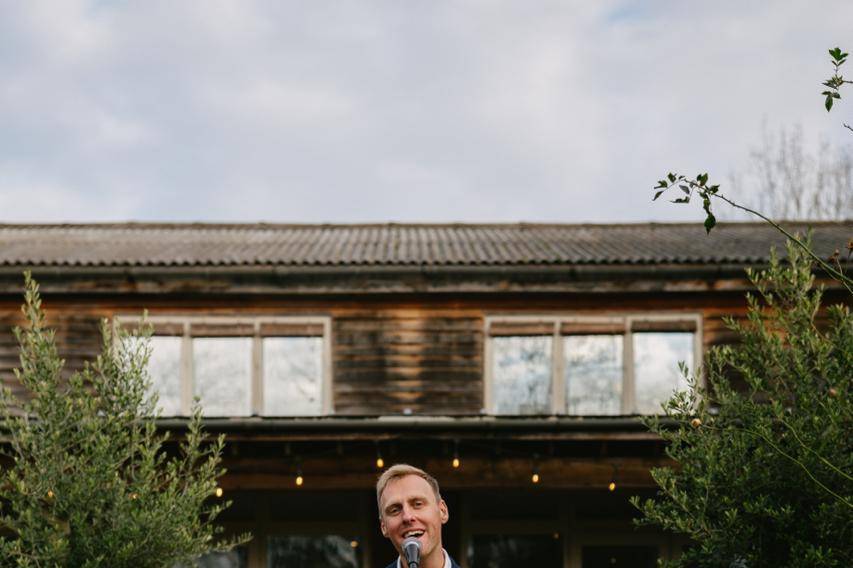 Musician plays outside wedding