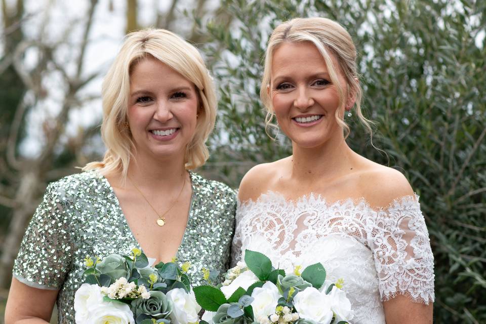 Bride and bridesmaid