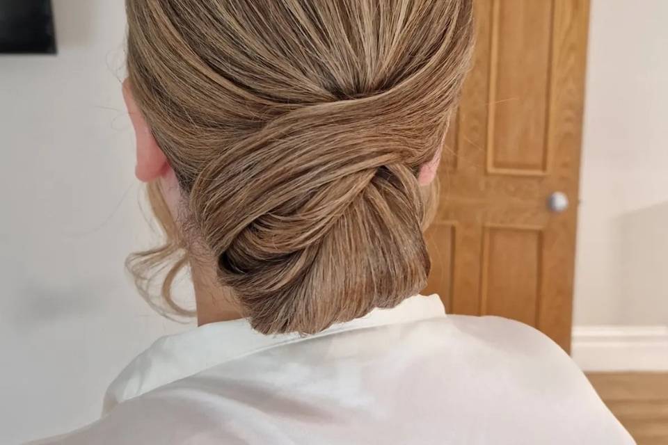 Beautiful sleek low updo