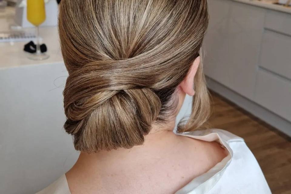 Beautiful sleek low updo