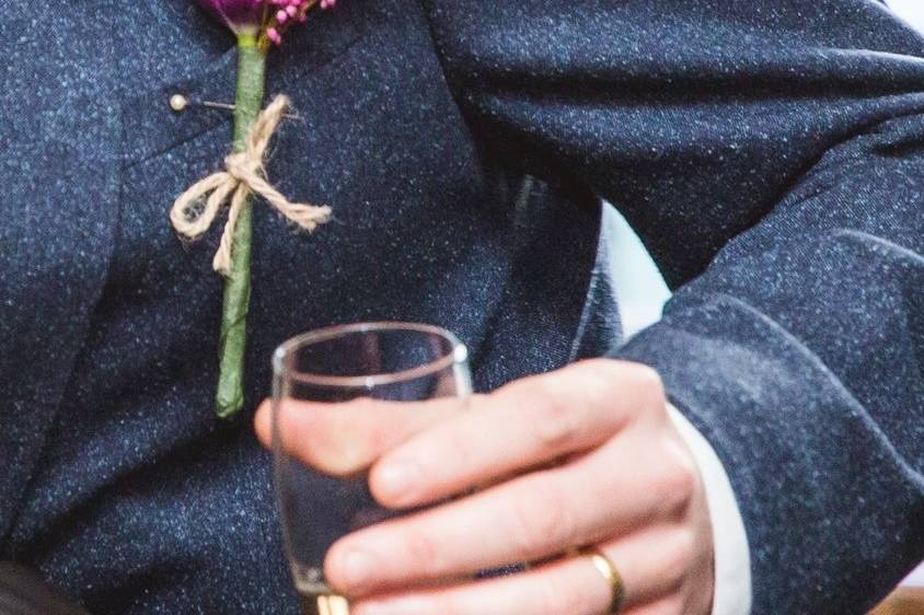 Tulip and peacock buttonhole