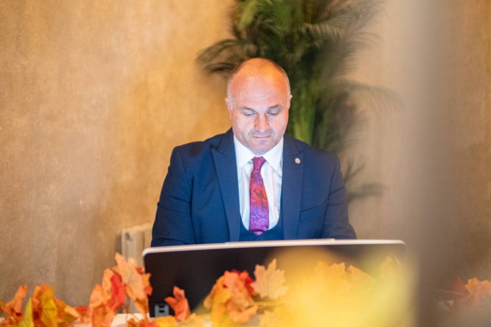 speaker addressing guests at lectern