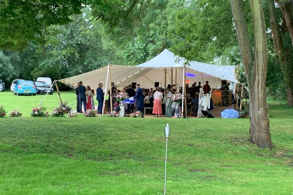 August canopy wedding